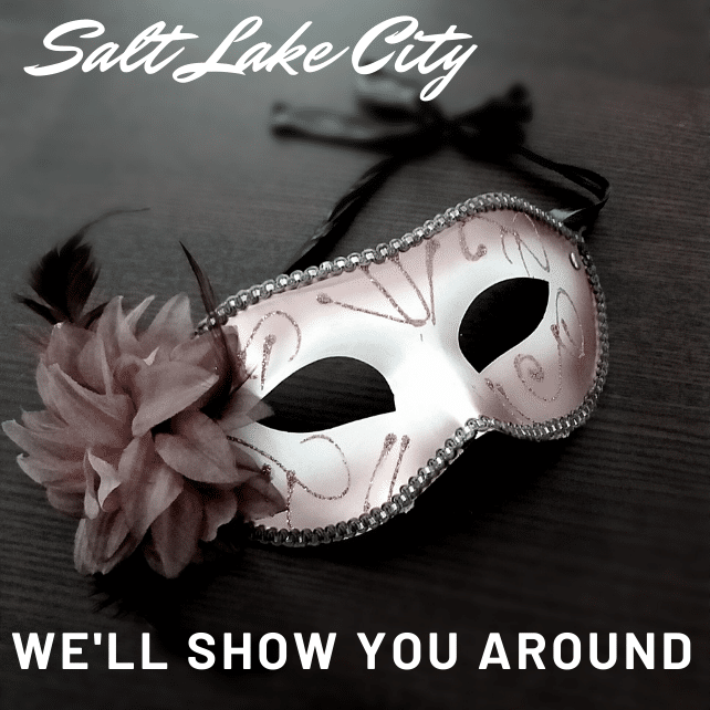 A photograph of a theatre mask on a gray background with the words, "Salt Lake City, We'll Show You Around."